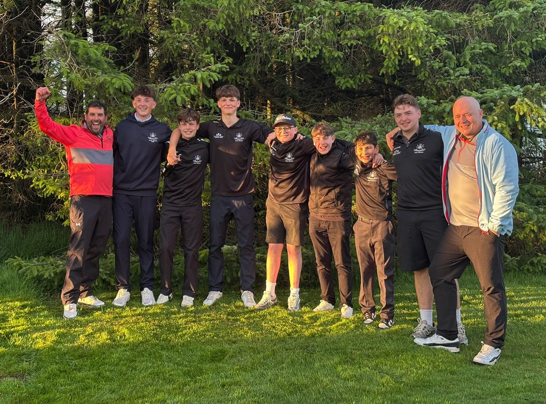 The Bonnyton junior team celebrating together on the course