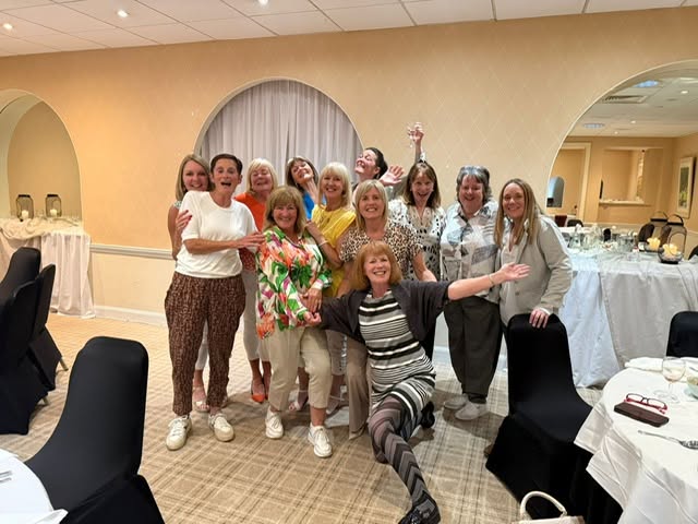 Members of the Bonnyton Ladies section celebrating together at a club evening