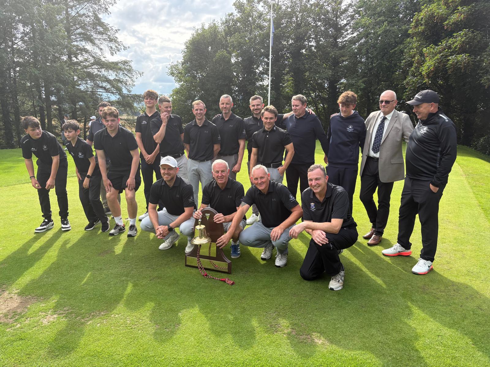 The Bonnyton gents and junior squads with the Boundary Bell after beating Glasgow Golf Club at Lenzie